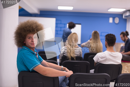 Image of Portrait of young informal businessman
