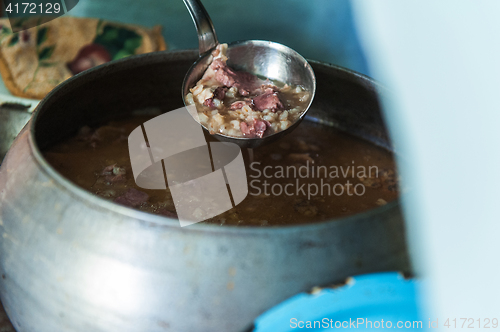 Image of cooking meals in a Russian stove