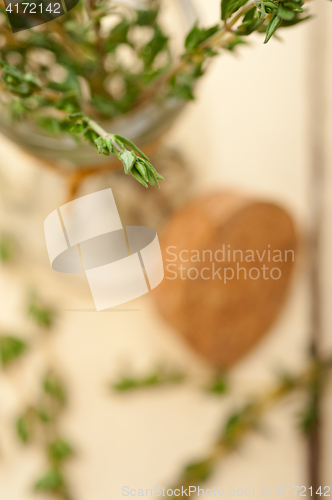 Image of fresh thyme on a glass jar