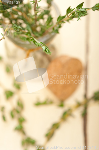 Image of fresh thyme on a glass jar