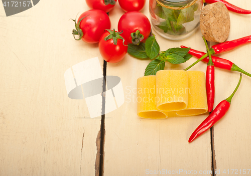 Image of Italian pasta paccheri with tomato mint and chili pepper