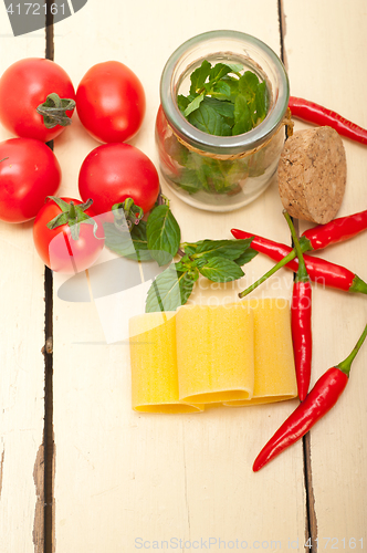 Image of Italian pasta paccheri with tomato mint and chili pepper