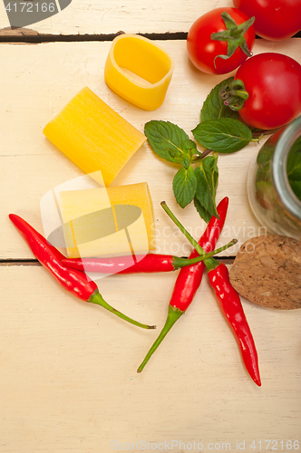 Image of Italian pasta paccheri with tomato mint and chili pepper