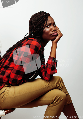 Image of young pretty african-american girl posing cheerful emotional on white background isolated, lifestyle people concept 