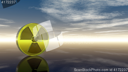 Image of nuclear symbol under cloudy sky - 3d illustration