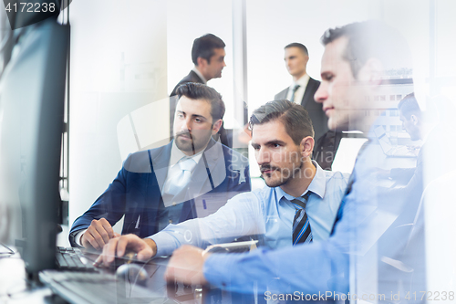 Image of Business team working in corporate office.