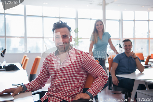 Image of Portrait of young informal businessman