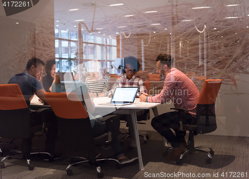 Image of Multiethnic startup business team on meeting