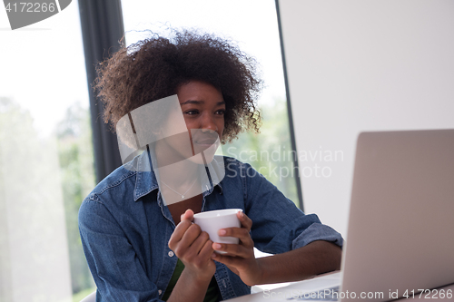 Image of African American woman in the living room