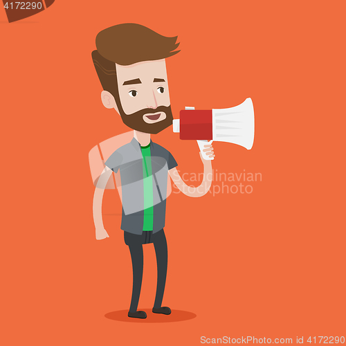 Image of Young hipster man speaking into megaphone.
