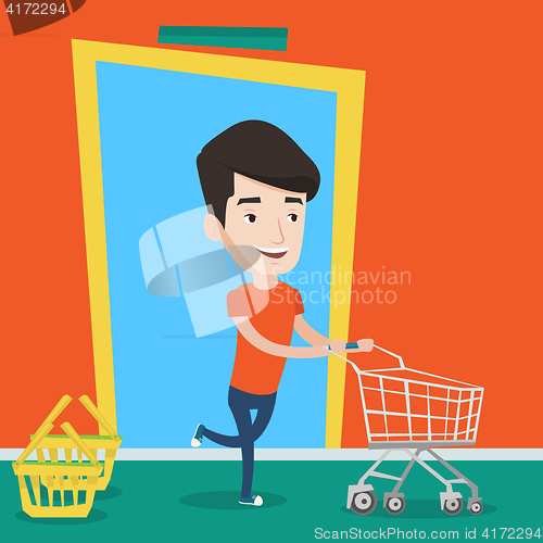 Image of Male customer running into the shop with trolley.