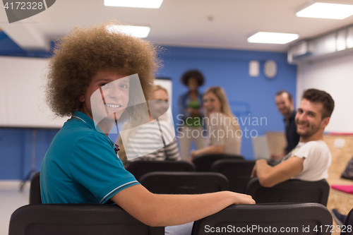 Image of Portrait of young informal businessman