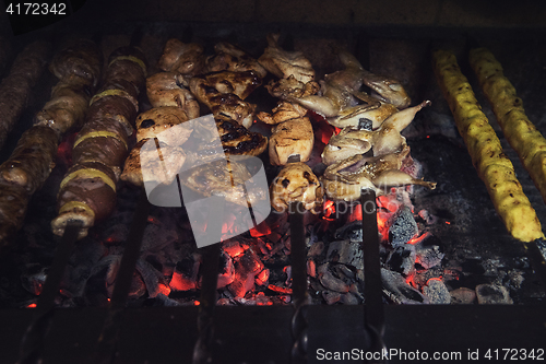 Image of Grilling marinated shashlik