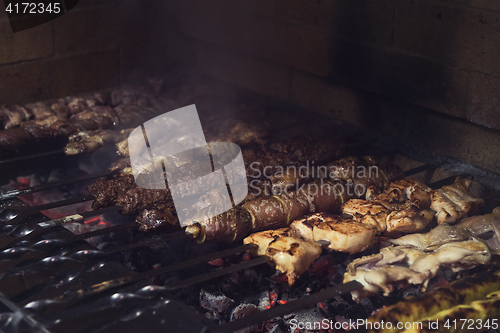 Image of Grilling marinated shashlik