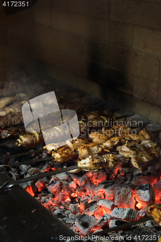 Image of Grilling marinated shashlik