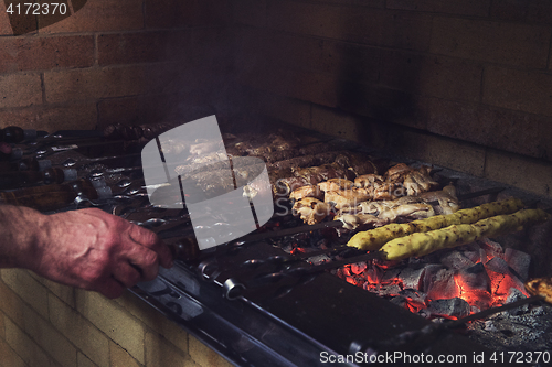 Image of Grilling marinated shashlik