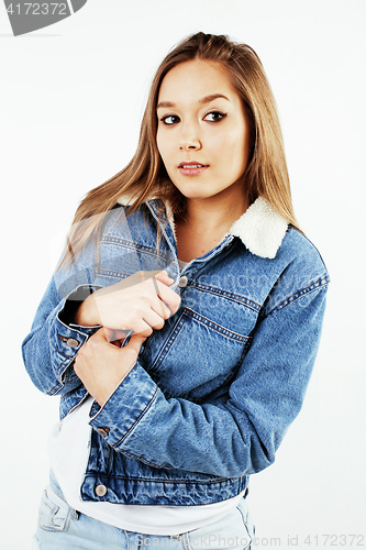 Image of young pretty teenage hipster girl posing emotional happy smiling on white background, lifestyle people concept