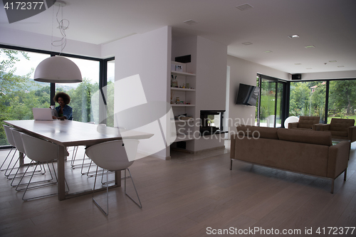 Image of African American woman in the living room