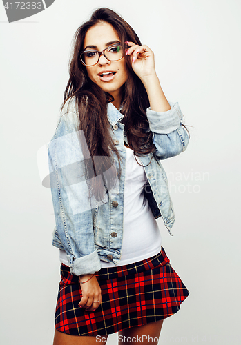 Image of young pretty teenage hipster girl posing emotional happy smiling on white background, lifestyle people concept