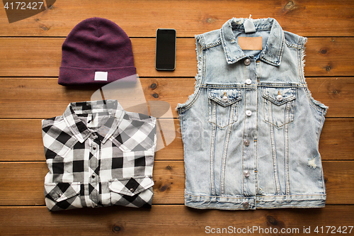 Image of casual clothes and smartphone