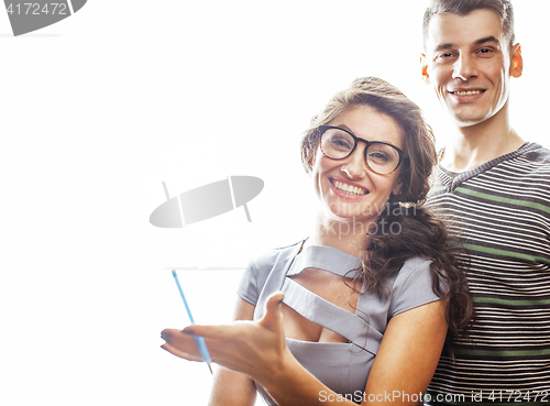 Image of young pretty teenage couple, hipster guy with his girlfriend hap