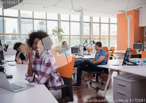Image of African American informal business woman working in the office