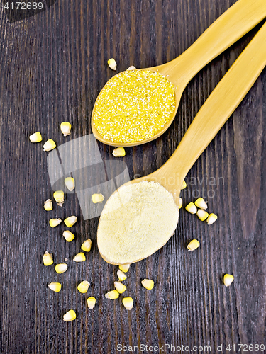 Image of Flour and cereals corn in spoon on dark board top