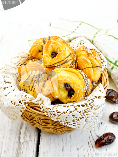 Image of Cookies with dates in basket on light board