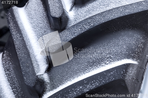 Image of New car tyre closeup photo