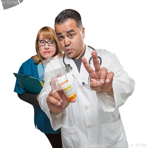 Image of Goofy Doctor and Nurse with Prescription Bottle Isolated on a Wh