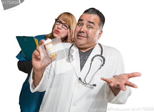 Image of Goofy Doctor and Nurse with Prescription Bottle Isolated on a Wh