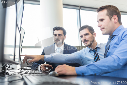 Image of Business team working in corporate office.