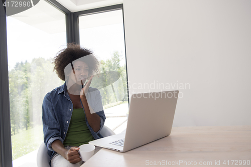 Image of African American woman in the living room