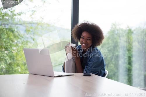 Image of African American woman in the living room