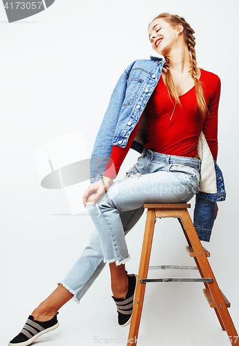 Image of young pretty teenage hipster girl posing emotional happy smiling on white background, lifestyle people concept