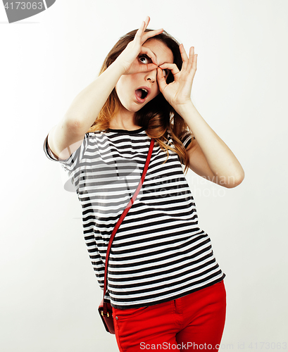 Image of young pretty teenage hipster girl posing emotional happy smiling on white background, lifestyle people concept