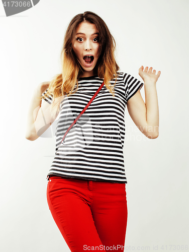Image of young pretty teenage hipster girl posing emotional happy smiling on white background, lifestyle people concept