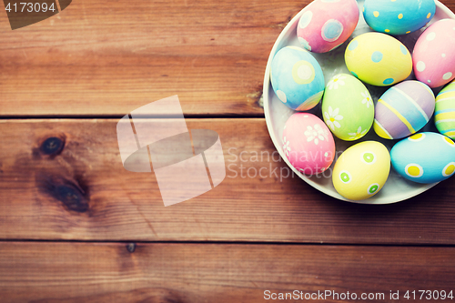 Image of close up of colored easter eggs on plate