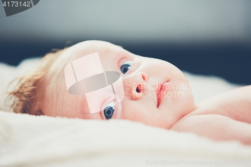 Image of Cheerful baby with blue eyes