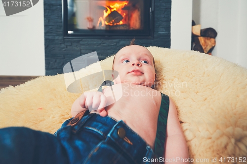 Image of Cheerful baby at home