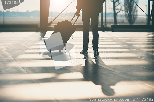 Image of Shadow of the traveler at the airport