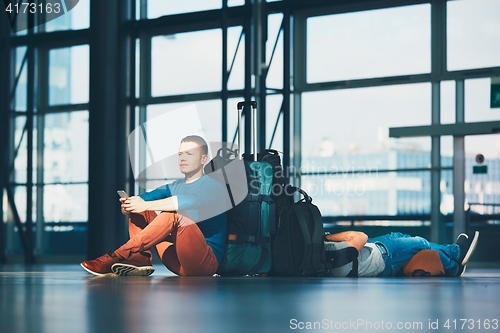 Image of Travelers waiting for departure