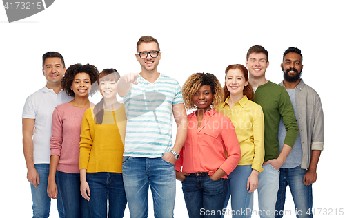 Image of international group of people pointing on you