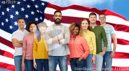 Image of international group of people over american flag