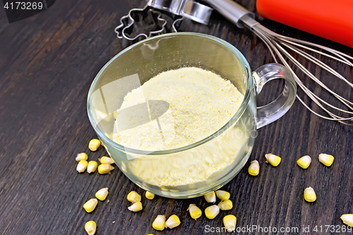 Image of Flour corn in glass cup on board