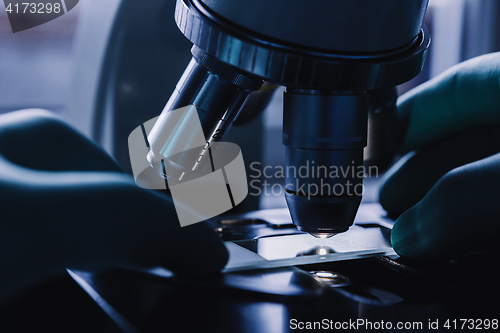 Image of Close up view of glass under microscope