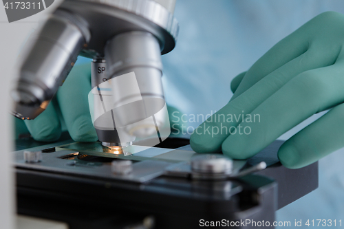 Image of Close up view of glass under microscope