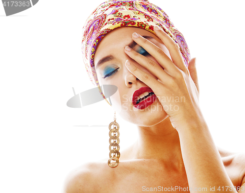Image of young pretty modern girl with bright shawl on head emotional pos