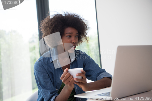 Image of African American woman in the living room