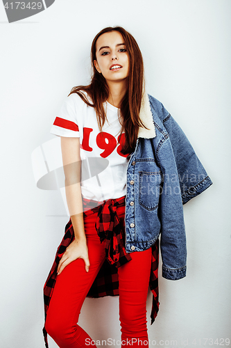 Image of young pretty teenage hipster girl posing emotional happy smiling on white background, lifestyle people concept